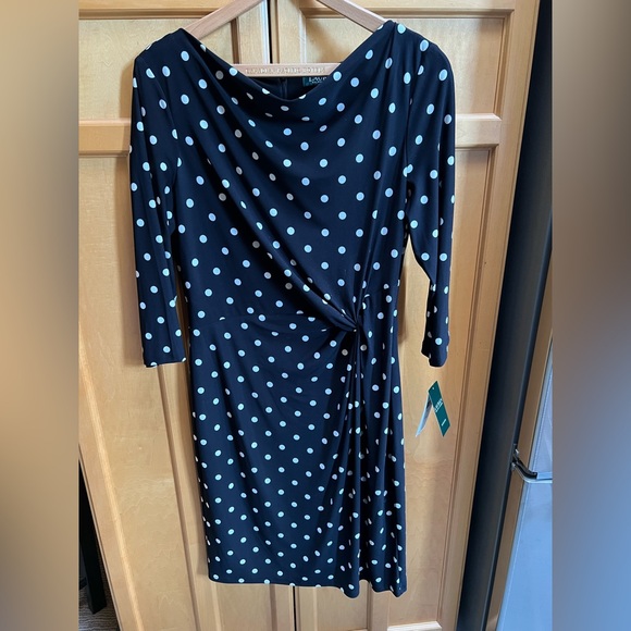 Never worn Navy and white polka dot dress
Size 12 - Picture 1 of 6